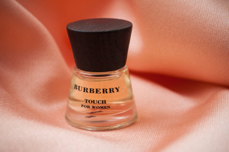 Mulhouse - France - 13 November 2019 - Closeup of Burberry perfume in a transparent bottle on satin backgroundのeditorial素材