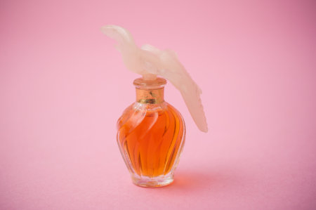 Mulhouse - France - 13 November 2019 - Closeup of Nina Ricci bottle of luxury perfume on pink backgroundのeditorial素材