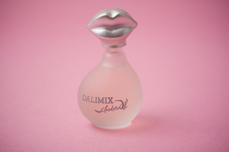 Mulhouse - France - 13 November 2019 - Closeup of Dalimix perfume from Salvator dali brand in transparent bottle on pink backgroundのeditorial素材
