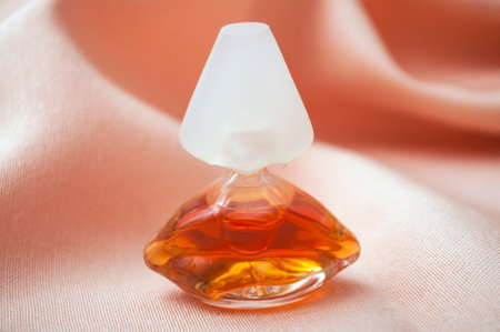 Mulhouse - France - 13 November 2019 - Closeup of Salvator Dali perfume in two transparent bottle in shaped mouth on satin backgroundのeditorial素材