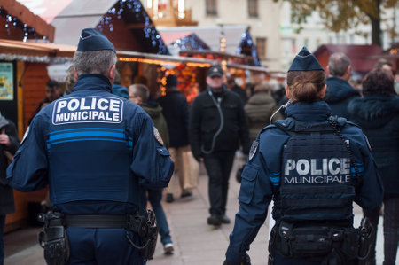 Mulhouse - France - 23 November 2019 - police patrol in the pedestrian street at the christmas marketのeditorial素材