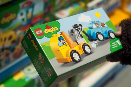 Mulhouse - France - 7 December 2019 - Closeup of lego duplo box in hand of woman in a toy store supermarketのeditorial素材