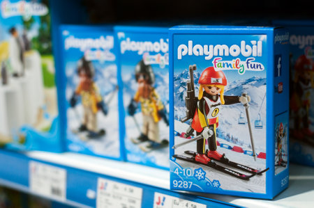Mulhouse - France - 7 December 2019 - Closeup of skier playmobil toys in a blue box packaging a toys storeのeditorial素材
