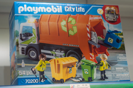 Mulhouse - France - 7 December 2019 - Closeup of playmobil toys with recycling truck in a blue box packaging a toys storeのeditorial素材