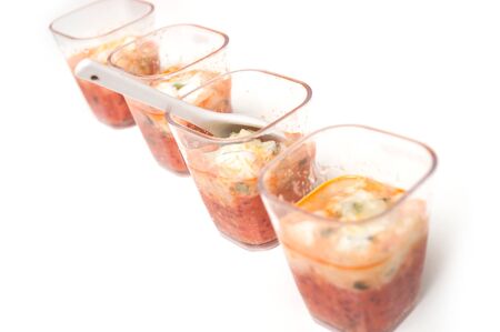 Closeup of mini appetizers in a little glasses の写真素材