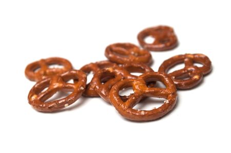 Closeup of salted pretzels on white backgroundの写真素材