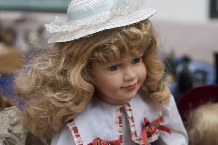 Closeup of vintage dolls at flea market in the streetの写真素材