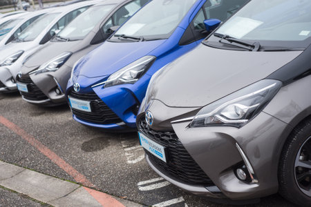 Mulhouse - France - 29 December 2019 - Closeup of Toyota cars alignment in a Toyota retailerのeditorial素材