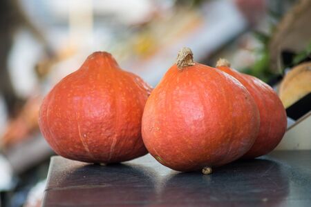 Closeup of orange pumpkins at the marketの写真素材