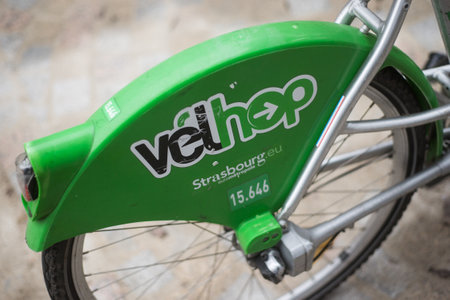 Strasbourg - France - 1 January 2020 -  Closeup of rental bike by velhop parked in the streetのeditorial素材