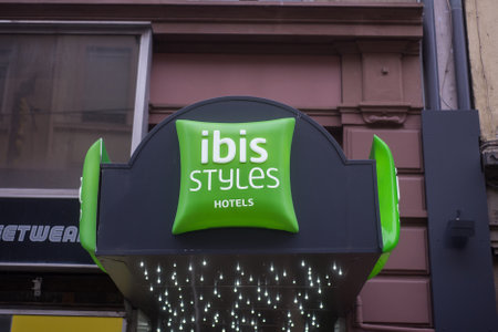 Strasbourg - France - 1 January 2020 -  Closeup of Ibis Hotel style logo on the building entry in the streetのeditorial素材