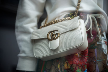 Mulhouse - France - 2 February 2020 - Closeup of beige leather handbag by Gucci in a luxury fashion store showroomのeditorial素材