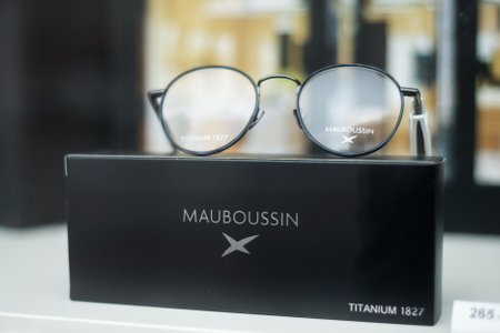 Mulhouse - France - 2 February 2020 - Closeup of luxury eye glasses by Mauboussin in a optician store showroomのeditorial素材