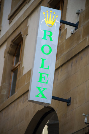 Basel - Switzerland - 7 February 2020 - Closeup of Rolex logo on signboard on jewelry front in the streetのeditorial素材