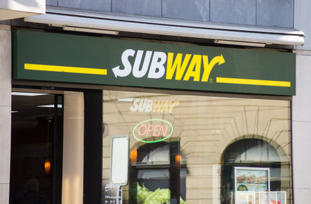 Basel - Switzerland - 7 February 2020 - Closeup of subway logo on fast food facade in the streetのeditorial素材