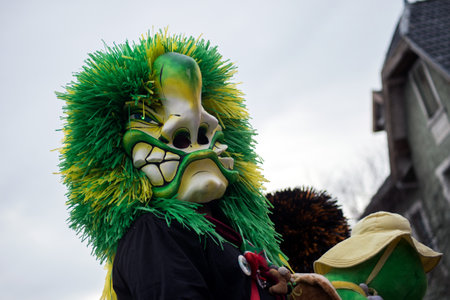 riedisheim - France - 8 February 2020 - People parading in the street with mask and green wig during the carnivalのeditorial素材