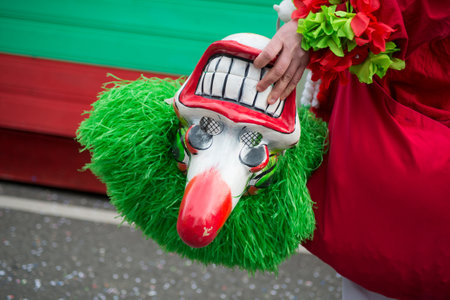 riedisheim - France - 8 February 2020 - People parading in the street with mask and green wig in...