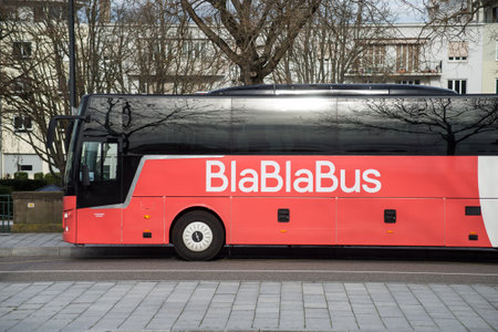 Mullhouse- France - 16 February 2020 - View of red blablabus in front of the train station in the street, blablabus is the famous intercity travel companyのeditorial素材