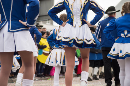 Neuenburg - Germany - 23 February 2020 - Closeup of legs of girls with sexy costume of cheerleader...