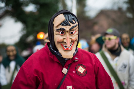 Neuenburg - Germany - 23 February 2020 - portrait of people with carnival mask parading in the...