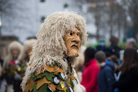 Neuenburg - Germany - 23 February 2020 - portrait of people with carnival mask of witch parading in the streetのeditorial素材