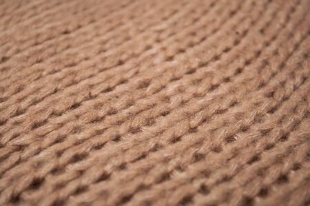 Closeup of brown woolen pullover texture 