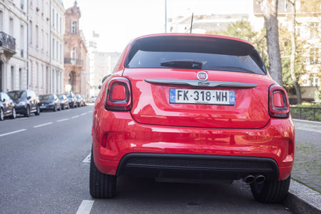 Mulhouse - France - 15 March 2020 - Rear view of red Fiat 500X parked in the streetのeditorial素材