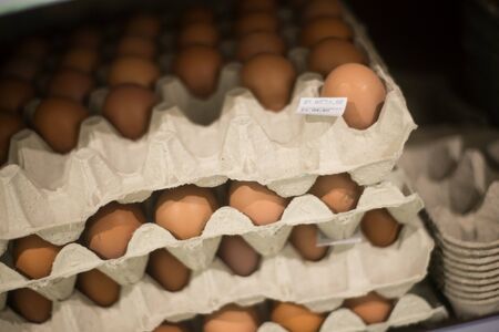 Closeup of fresh eggs for sale at the supermarketの写真素材