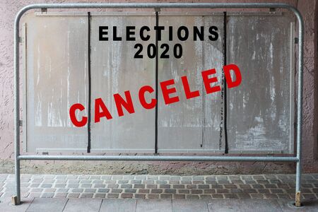 Closeup of elections panel in the street during the Covid-19 pandemic with the message : Canceled