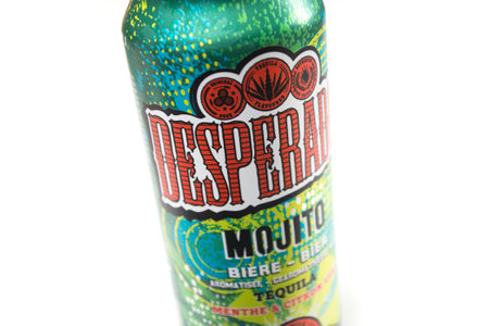 Mulhouse - France - 14 April 2020 - Closeup of Desperados beer flavored mojito cocktail in a...
