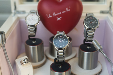 Mulhouse - France - 18 April 2020 - Closeup of watches by Mauboussin in a luxury fashion store showroomのeditorial素材