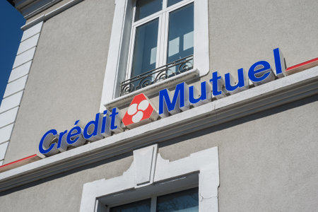 Mulhouse - France - 22 April 2020 - Closeup of Credit mutuel sign on bank agency facade in the streetのeditorial素材