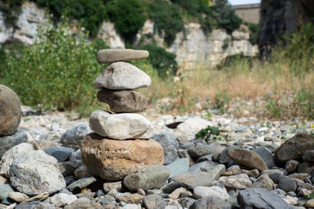Closeup of stone balance in the dry riverの写真素材