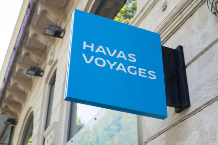 Beziers - France - 11 July 2020 - Closeup of Havas voyages sign on travel agency in the streetのeditorial素材