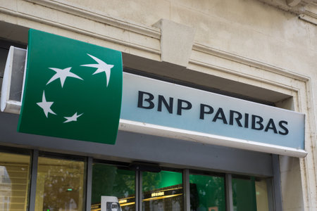 Beziers - France - 11 July 2020 - Closeup of BNP Paribas sign on bank agency facadeのeditorial素材