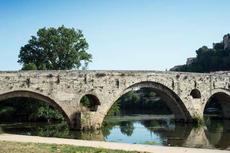 retail of old roman bridge and cathedral St Nazaire background in Beziers the city in south  Franceの写真素材
