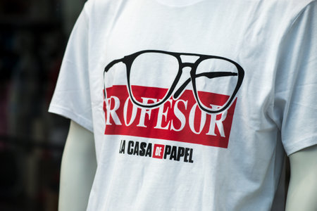 Mulhouse - France - 23 August 2020 - Closeup of la casa de papel logo on  on white tee shirt for men in a fashion store showroomのeditorial素材
