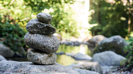 Closeup of stone balance in border river