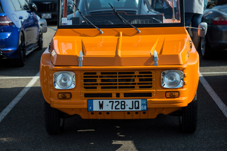 Mulhouse - France - 13 September 2020 - Front view of orange Citroen Mehari parked in the street