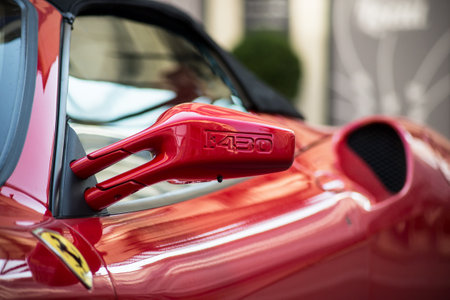 Mulhouse - France - 20 September 2020 - Closeup of sign on mirror of red Ferrari F430 convertible parked in the streetのeditorial素材