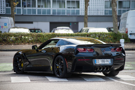 Mulhouse - France - 11 October 2020 - Rear view of Black chevrolet Corvette in the streetのeditorial素材