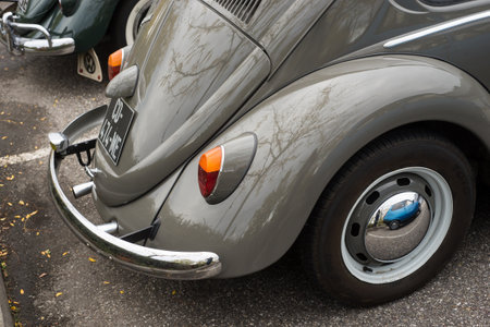 Mulhouse - France - 11 October 2020 - rear view of brown volkswagen beetle parked in the streetのeditorial素材