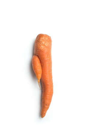 Closeup of strange carrot on white backgroundの写真素材