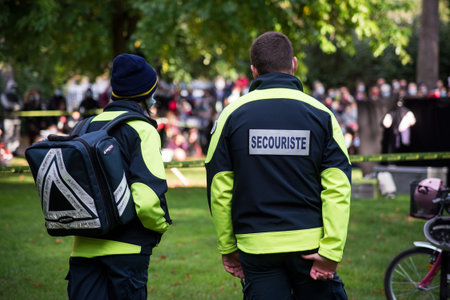 Mulhouse - France - 18 October 2020 - Portrait of volunters rescue people standing at the street scene festivalのeditorial素材