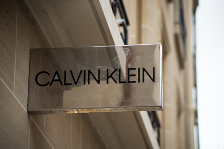 Paris - France - 24 October 2020 - Closeup of Calvin Klein sign on signboard on store facade in the streetのeditorial素材