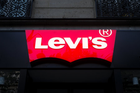 Paris - France - 24 October 2020 - Closeup of Levi's jeans logo on store front in the streetのeditorial素材