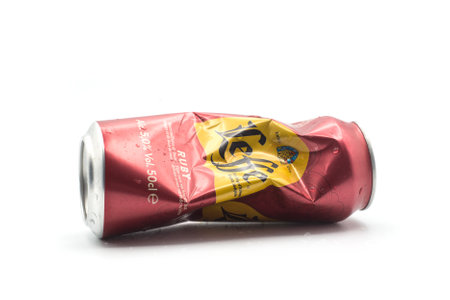 Mulhouse - France - 2 December 2020 - Closeup of crushed metallic can of Leffe Rubis beer on white backgroundのeditorial素材