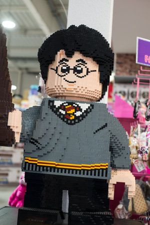 Mulhouse - France - 17 December 2020 - portrait of giant lego character in a toys storeのeditorial素材