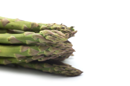 Closeup of organic asparagus on white backgroundの写真素材