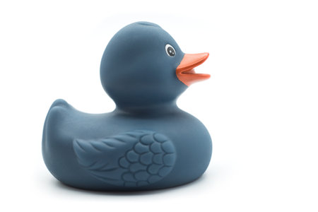 Closeup of blue plastic rubber duch on white backgroundの写真素材